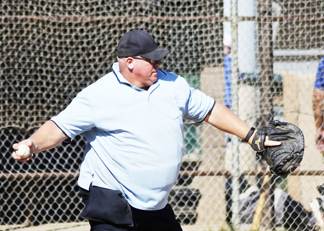 Lending a helping glove at Old-Timers game